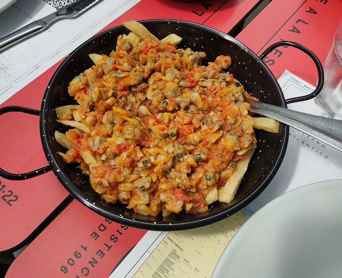 Berberechos con patatas fritas